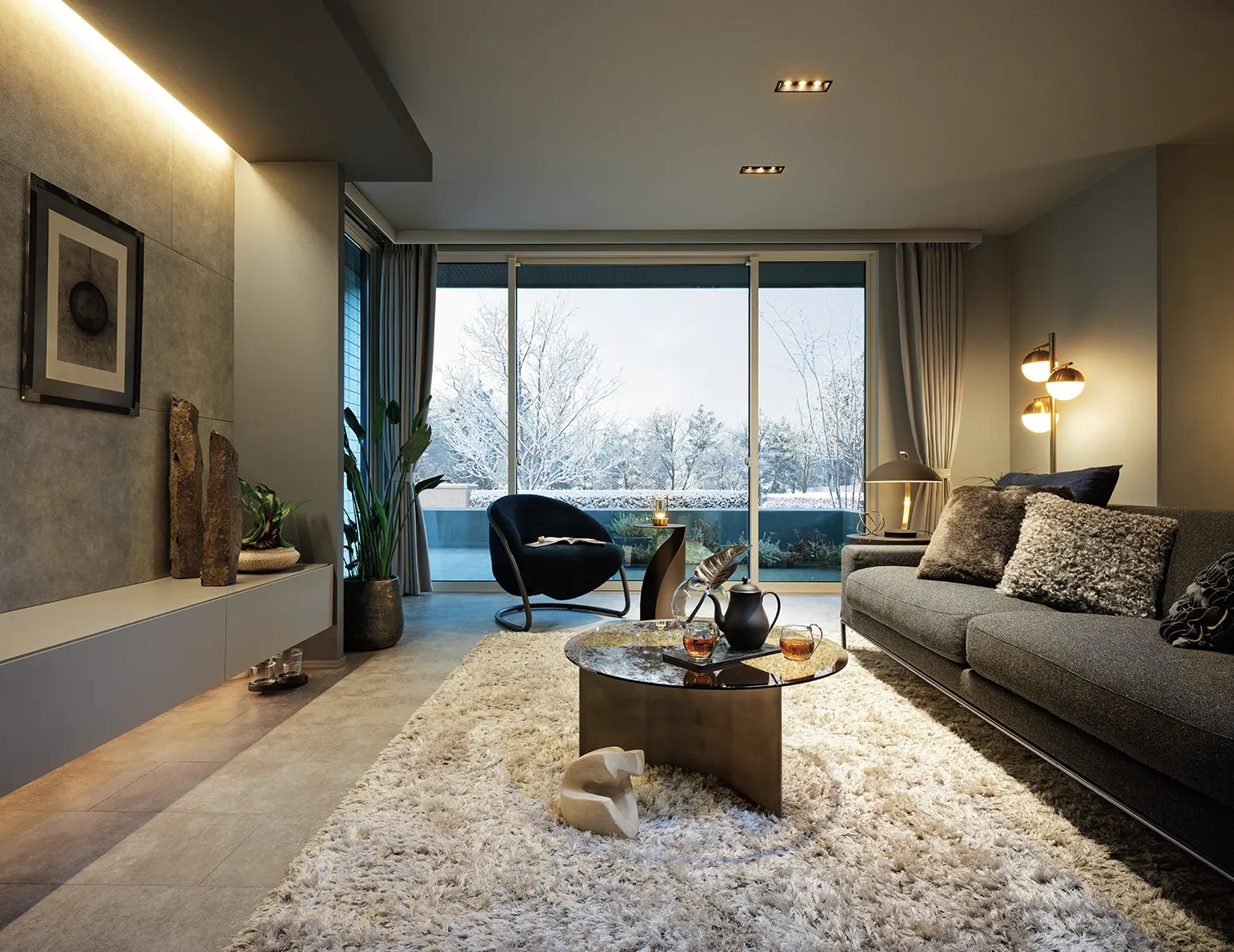 外には冬の景色が見える暖かそうな空間のLDK